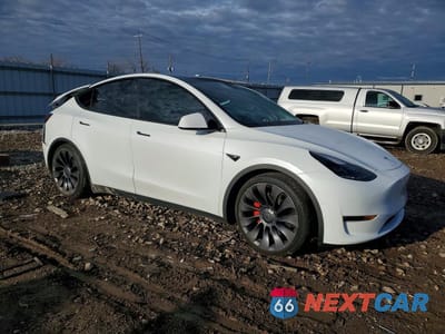 Czwarte zdjęcie samochodu z boku: 2022 TESLA MODEL Y VIN:7SAYGDEF5NF394903 - miniatura