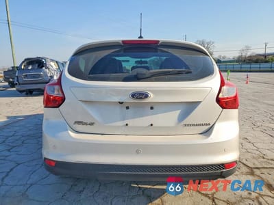 Zdjęcie 6 z 12 samochodu: 2014 FORD FOCUS TITANIUM VIN:1FADP3N27EL199827 - miniatura