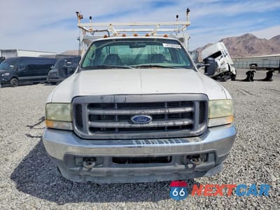 Piąte zdjęcie samochodu w środku: 2002 FORD F350 SUPER DUTY VIN:1FDWF36F72EC89806 - miniatura