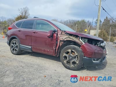 Czwarte zdjęcie samochodu z boku: 2019 HONDA CR-V TOURING VIN:2HKRW2H95KH653000 - miniatura