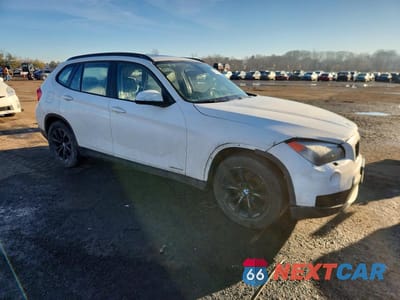 Czwarte zdjęcie samochodu z boku: 2013 BMW X1 XDRIVE28I VIN:WBAVL1C5XDVR82426 - miniatura