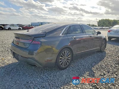 Trzecie zdjęcie samochodu z tyłu: 2017 LINCOLN MKZ PREMIERE VIN:3LN6L5A91HR633836 - miniatura