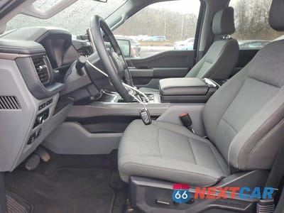 Zdjęcie 7 z 12 samochodu: 2024 FORD F150 LIGHTNING XLT VIN:1FT6W3L74RWG26910 - miniatura