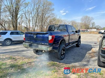 Czwarte zdjęcie samochodu z boku: 2016 NISSAN TITAN XD S VIN:1N6BA1F41GN500524 - miniatura