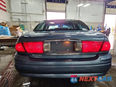 Zdjęcie 6 z 11 samochodu: 2001 BUICK LESABRE CUSTOM VIN:1G4HP54K41U235563 - miniatura