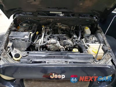 Zdjęcie 12 z 13 samochodu: 2012 JEEP WRANGLER UNLIMITED SAHARA VIN:1C4BJWEG6CL191585 - miniatura