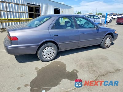 Trzecie zdjęcie samochodu z tyłu: 1999 TOYOTA CAMRY LE VIN:JT2BG22K0X0309517 - miniatura