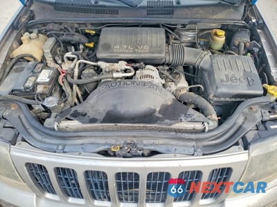Zdjęcie 12 z 13 samochodu: 1999 JEEP GRAND CHEROKEE LIMITED VIN:1J4GW68N1XC671972 - miniatura