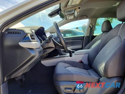 Zdjęcie 7 z 13 samochodu: 2021 TOYOTA CAMRY HYBRID LE VIN:4T1C31AK6MU552817 - miniatura