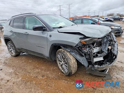 Czwarte zdjęcie samochodu z boku: 2022 JEEP COMPASS LIMITED VIN:3C4NJDCB4NT189415 - miniatura