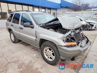 Czwarte zdjęcie samochodu z boku: 2002 JEEP GRAND CHEROKEE LAREDO VIN:1J4GW48S92C118408 - miniatura