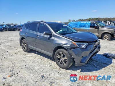 Czwarte zdjęcie samochodu z boku: 2018 TOYOTA RAV4 XLE VIN:2T3WFREV5JW462813 - miniatura