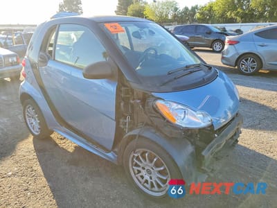 Czwarte zdjęcie samochodu z boku: 2014 SMART FORTWO PURE VIN:WMEEJ3BA0EK773817 - miniatura