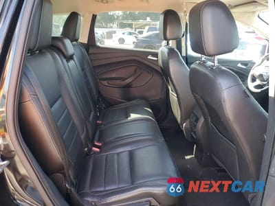 Zdjęcie 11 z 13 samochodu: 2014 FORD ESCAPE TITANIUM VIN:1FMCU0J90EUA07704 - miniatura