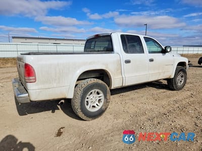 Trzecie zdjęcie samochodu z tyłu: 2002 DODGE DAKOTA QUAD SLT VIN:1B7HG48N22S616926 - miniatura