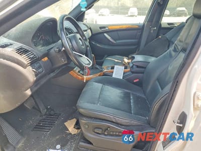 Zdjęcie 7 z 13 samochodu: 2004 BMW X5 4.4I VIN:5UXFB53564LV01034 - miniatura