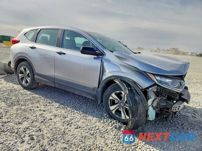 Czwarte zdjęcie samochodu z boku: 2018 HONDA CR-V LX VIN:2HKRW5H3XJH423464 - miniatura