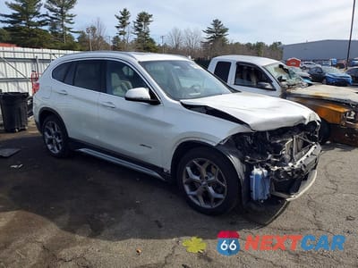 Czwarte zdjęcie samochodu z boku: 2016 BMW X1 XDRIVE28I VIN:WBXHT3C39G5E51819 - miniatura