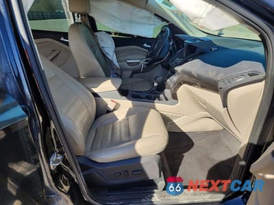 Zdjęcie 7 z 12 samochodu: 2017 FORD ESCAPE TITANIUM VIN:1FMCU9J98HUE47727 - miniatura