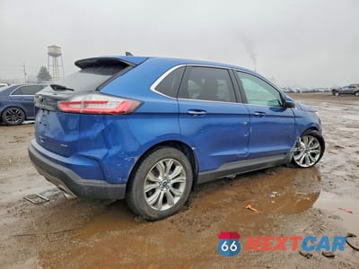 Trzecie zdjęcie samochodu z tyłu: 2022 FORD EDGE TITANIUM VIN:2FMPK4K90NBA13554 - miniatura