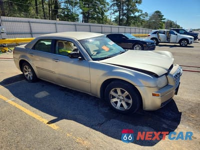 Czwarte zdjęcie samochodu z boku: 2006 CHRYSLER 300 TOURING VIN:2C3KA53G16H225936 - miniatura