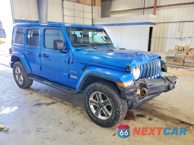 Czwarte zdjęcie samochodu z boku: 2023 JEEP WRANGLER SAHARA VIN:1C4HJXEN7PW572476 - miniatura