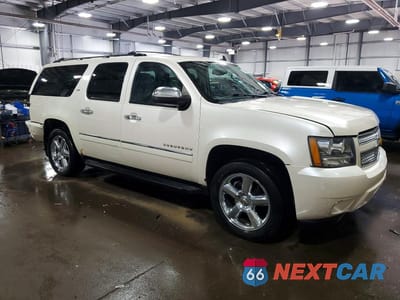 Czwarte zdjęcie samochodu z boku: 2012 CHEVROLET SUBURBAN K1500 LTZ VIN:1GNSKKE71CR201496 - miniatura