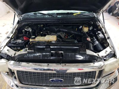 Zdjęcie 12 z 13 samochodu: 2002 FORD EXCURSION LIMITED VIN:1FMNU43S42ED37058 - miniatura