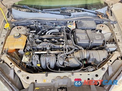 Zdjęcie 11 z 11 samochodu: 2007 FORD FOCUS ZX4 VIN:1FAHP34N27W282502 - miniatura