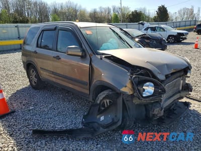 Czwarte zdjęcie samochodu z boku: 2002 HONDA CR-V EX VIN:JHLRD78862C080021 - miniatura