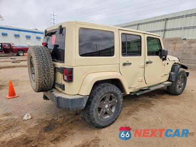 Trzecie zdjęcie samochodu z tyłu: 2011 JEEP WRANGLER UNLIMITED SPORT VIN:1J4BA3H10BL615826 - miniatura