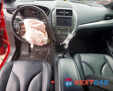 Zdjęcie 8 z 12 samochodu: 2015 LINCOLN MKC VIN:5LMCJ1A99FUJ14652 - miniatura