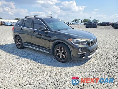 Czwarte zdjęcie samochodu z boku: 2016 BMW X1 XDRIVE28I VIN:WBXHT3C3XG5E48590 - miniatura