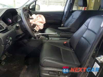 Zdjęcie 7 z 13 samochodu: 2021 HONDA PILOT TOURING VIN:5FNYF6H99MB033092 - miniatura