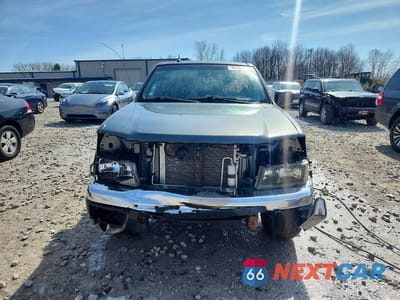 Piąte zdjęcie samochodu w środku: 2011 GMC CANYON SLT VIN:1GTH6NFE6B8108354 - miniatura