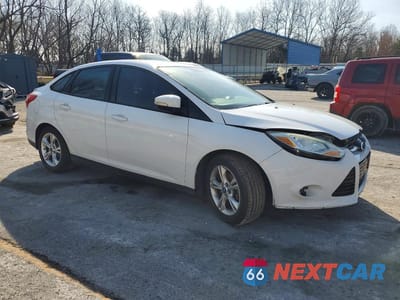 Czwarte zdjęcie samochodu z boku: 2013 FORD FOCUS VIN:1FADP3F2XDL123712 - miniatura