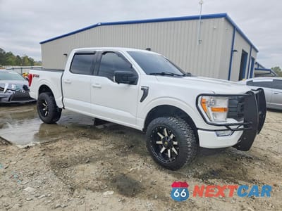 Czwarte zdjęcie samochodu z boku: 2021 FORD F150 SUPERCREW VIN:1FTEW1EP3MFA56209 - miniatura