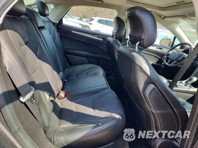 Zdjęcie 10 z 12 samochodu: 2014 FORD FUSION TITANIUM VIN:3FA6P0K9XER351982 - miniatura