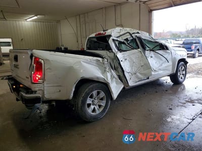 Trzecie zdjęcie samochodu z tyłu: 2015 GMC CANYON SLE VIN:1GTG5BE33F1129870 - miniatura