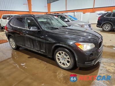 Czwarte zdjęcie samochodu z boku: 2014 BMW X1 XDRIVE28I VIN:WBAVL1C56EVY23677 - miniatura