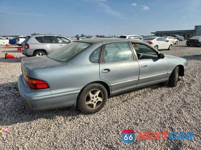 Trzecie zdjęcie samochodu z tyłu: 1999 TOYOTA AVALON XLS VIN:4T1BF18B4XU320455 - miniatura