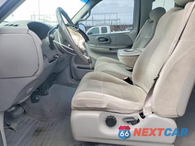 Zdjęcie 7 z 12 samochodu: 2001 FORD F150 VIN:1FTRX17WX1KF59953 - miniatura