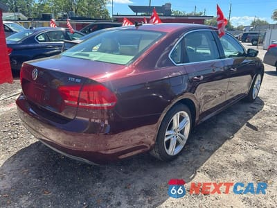 Czwarte zdjęcie samochodu z boku: 2014 VOLKSWAGEN PASSAT SE VIN:1VWBN7A39EC002991 - miniatura