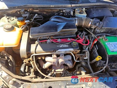 Zdjęcie 7 z 10 samochodu: 2000 FORD FOCUS SE VIN:1FAFP3433YW219500 - miniatura