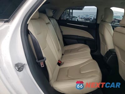 Zdjęcie 10 z 11 samochodu: 2017 FORD FUSION TITANIUM PHEV VIN:3FA6P0SU0HR141965 - miniatura