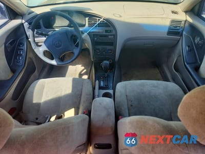 Zdjęcie 8 z 11 samochodu: 2002 HYUNDAI ELANTRA GLS VIN:KMHDN45D22U418489 - miniatura