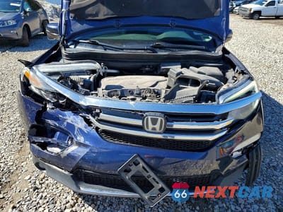 Zdjęcie 12 z 13 samochodu: 2016 HONDA PILOT TOURING VIN:5FNYF6H93GB006006 - miniatura