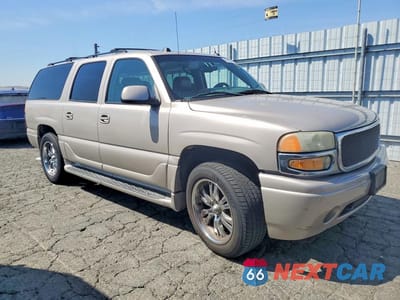 Czwarte zdjęcie samochodu z boku: 2005 GMC YUKON XL DENALI VIN:1GKFK66U95J266947 - miniatura