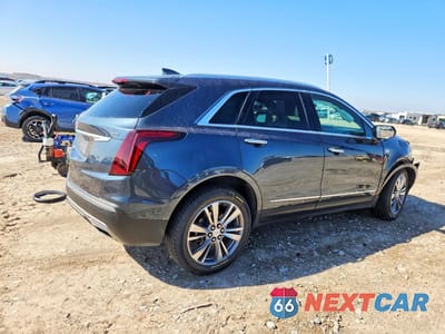 Trzecie zdjęcie samochodu z tyłu: 2021 CADILLAC XT5 PREMIUM LUXURY VIN:1GYKNDRS9MZ137519 - miniatura