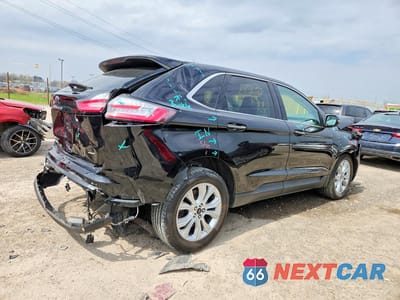 Trzecie zdjęcie samochodu z tyłu: 2023 FORD EDGE TITANIUM VIN:2FMPK4K95PBA19658 - miniatura